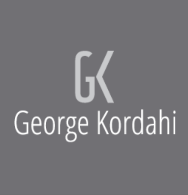G George Kerdahi Logo