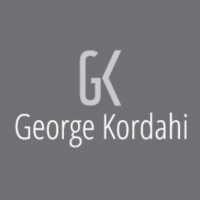 G George Kerdahi Logo